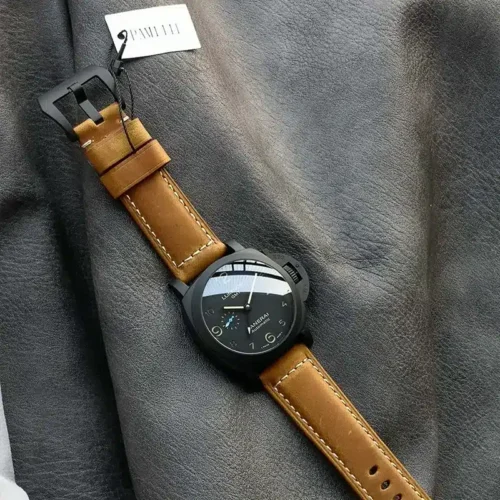 Matte black buckle at the top of the strap, case lower down