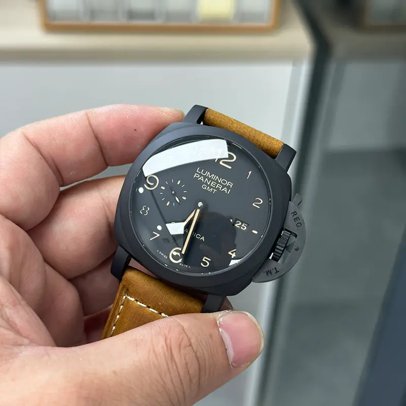 Black crown protector and lever seen with the dial angled away