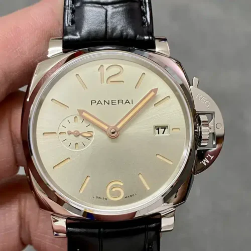 Champagne dial straight on, gold tone hands and a 17 in the date window