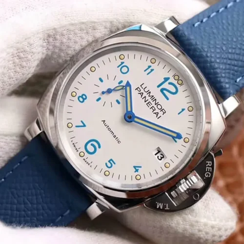 Tilted dial showing the 9 o'clock small seconds and lume-filled blue hands