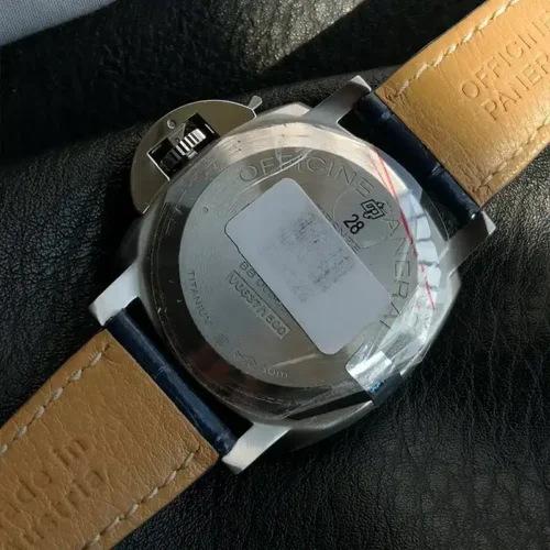 Solid back under protective film, white label and sticker 28 on it