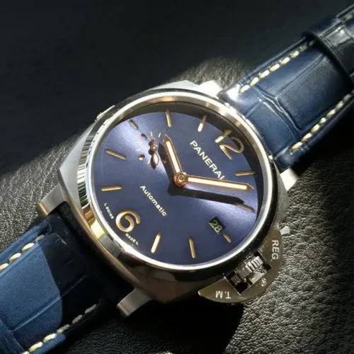 Closer angle on the Panerai print, gold tone 12 and date at 3