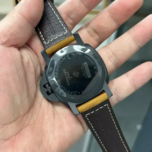 Black caseback with Firenze 1860 lettering and a numbered plate, brown strap lining