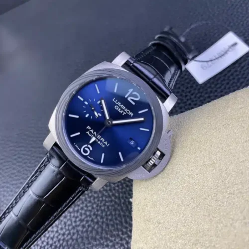 Diagonal shot on the pillow, black leather strap and hang tag behind