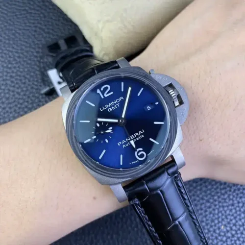 Luminor GMT on the wrist, blue dial and matte grey case against bare skin