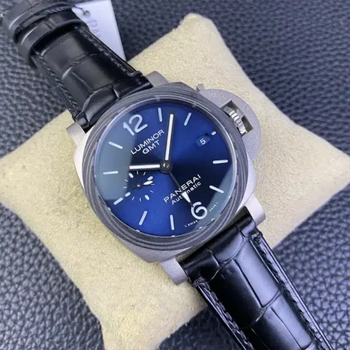 Blue dial tipped toward 9 o'clock, white hands and luminous batons
