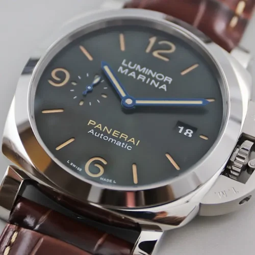 Small seconds subdial, date window and beige hour markers up close