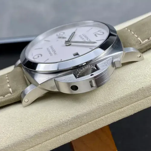 Crown guard and lever seen from below the polished bezel