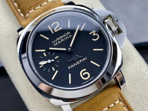 Dial close up, beige 12 and 3 under the polished bezel