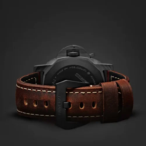 Rear view with a distressed brown strap on a dark grey backdrop