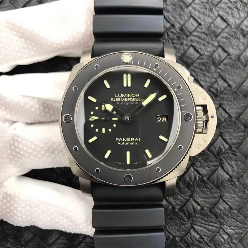 Black dial and bezel with lume dots, held in a white dotted glove