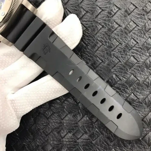 Black rubber strap with a moulded logo and adjustment holes
