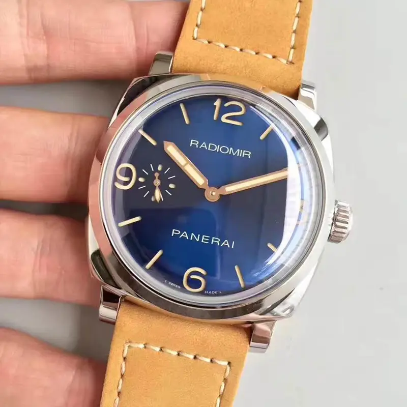 Sunburst blue dial turned slightly right, beige lume on the hands