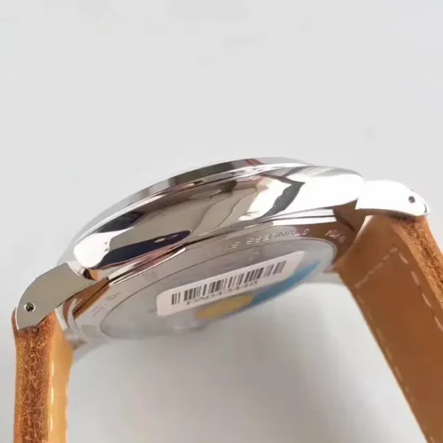 Left side and lug, a barcode sticker still on the caseback