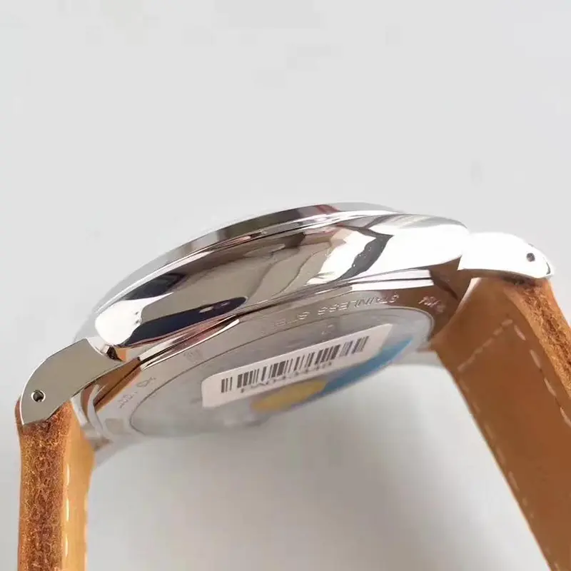 Left side and lug, a barcode sticker still on the caseback