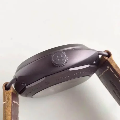 Side view on white, the crown with an engraved logo and wire lug