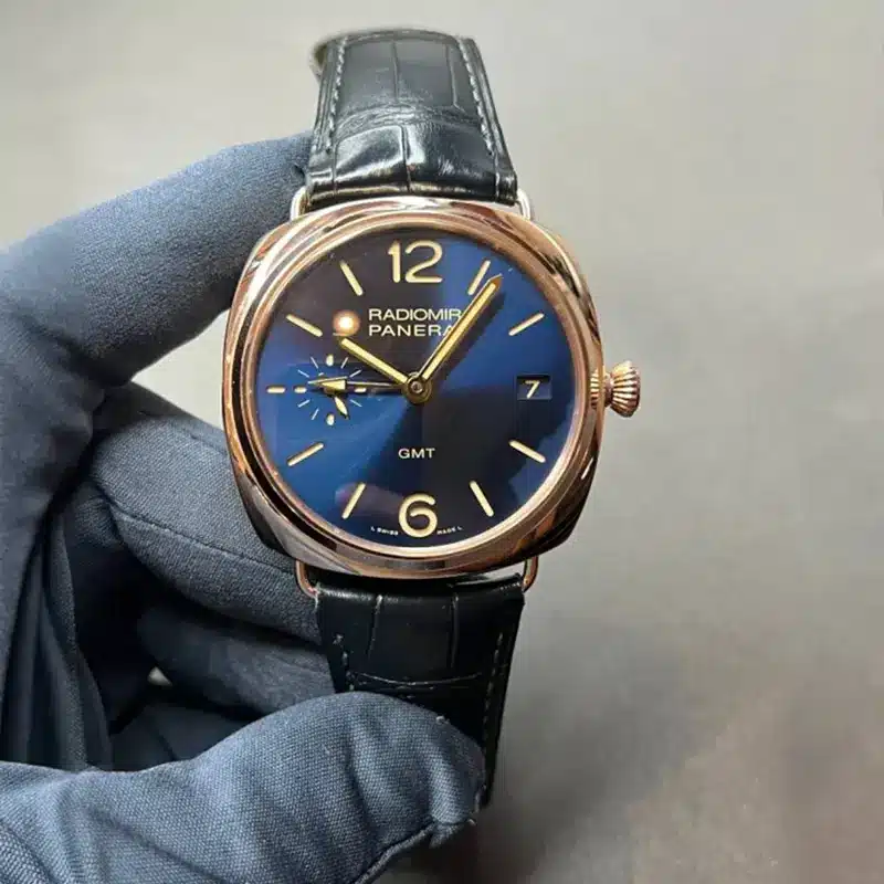 Radiomir GMT PAM598 held face on, small seconds at 9