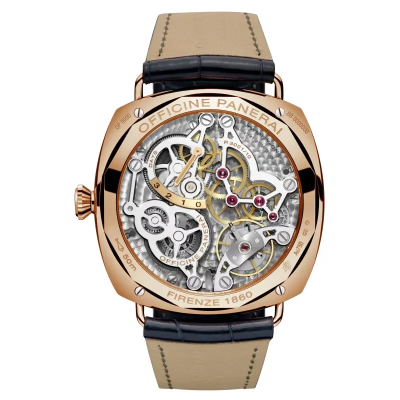 Skeletonised movement seen through a rose gold tone caseback, beige strap lining