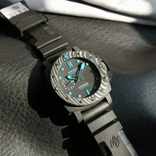 Submersible Carbotech PAM960 set diagonally, embossed logo on the black rubber