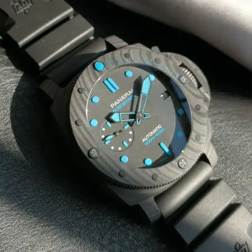 Tilted close view, aqua minute hand over the grained bezel