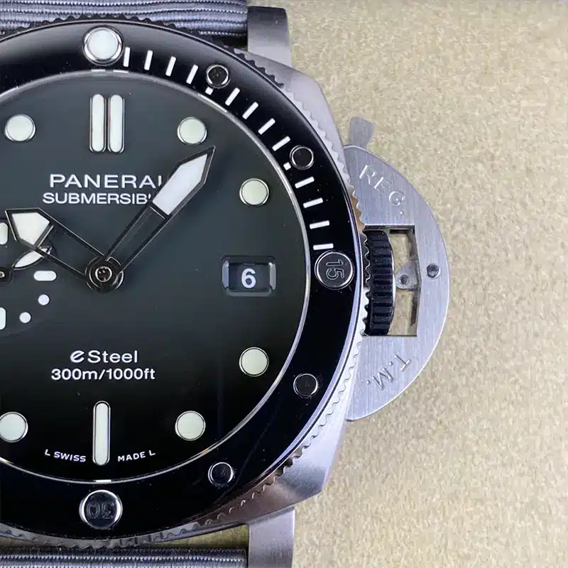 Macro of the dark dial at 3, date 6 and the hinged guard