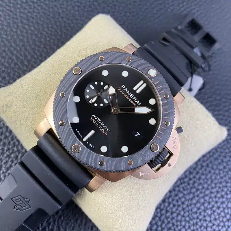 Watch angled right so the gold tone lugs and crown guard show