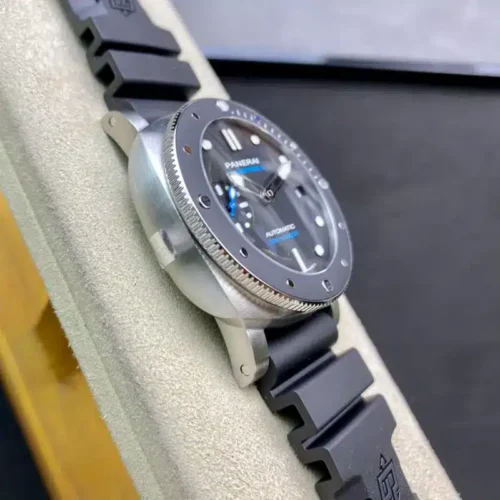 Watch standing on its side, brushed flank under the knurled bezel