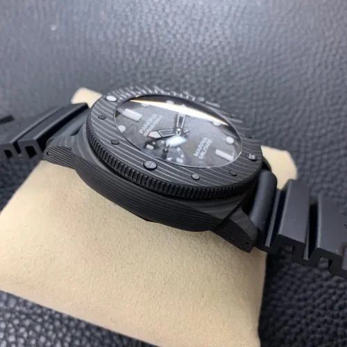 Left flank in profile, striped black texture of the case and knurled bezel