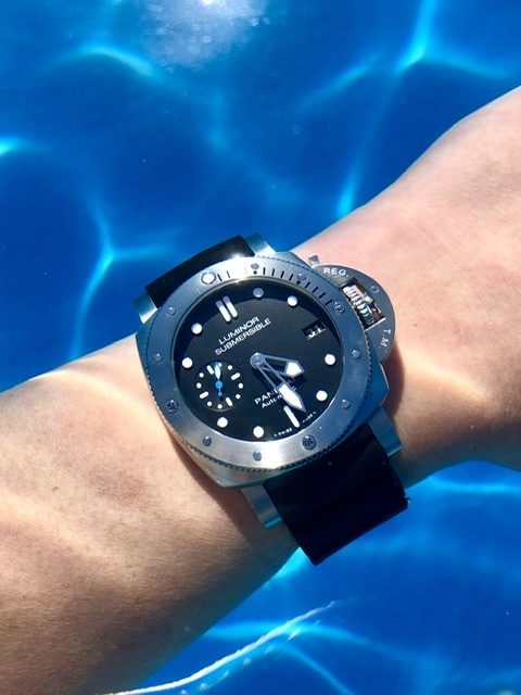 Panerai Submersible dive watch on wrist with rotating ceramic bezel